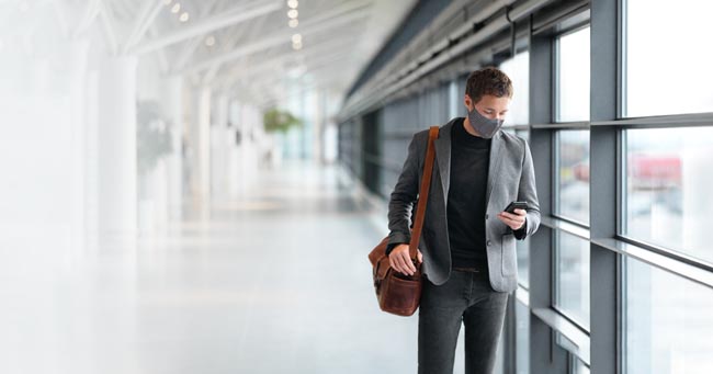 Travel,Business,Man,Wearing,Coronavirus,Face,Mask,Walking,In,Airport